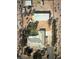 Aerial view of the home showcasing the property layout, surrounding landscape, and ample parking at 10561 Rancho Destino Rd, Las Vegas, NV 89183