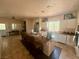 Kitchen featuring a breakfast bar and open design with tile flooring at 10561 Rancho Destino Rd, Las Vegas, NV 89183