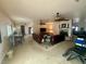 Large living room featuring a fireplace and views to the kitchen at 10561 Rancho Destino Rd, Las Vegas, NV 89183