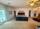 Bright main bedroom with large bed and french doors at 10561 Rancho Destino Rd, Las Vegas, NV 89183