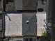 Aerial view shows a small, gray roof and a small, gravel-covered backyard at 1109 E Tonopah Ave, North Las Vegas, NV 89030