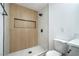 Contemporary bathroom featuring a glass-enclosed shower with a tiled wall and modern fixtures at 1109 E Tonopah Ave, North Las Vegas, NV 89030