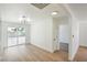 Bright bedroom featuring new flooring and sliding glass door providing ample natural light and backyard access at 1109 E Tonopah Ave, North Las Vegas, NV 89030