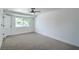 Comfortable bedroom featuring new carpet, fresh paint, and an abundance of natural light at 1109 E Tonopah Ave, North Las Vegas, NV 89030