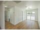 Bedroom with new flooring, closet and sliding glass door providing ample natural light and backyard access at 1109 E Tonopah Ave, North Las Vegas, NV 89030