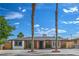 Charming single-story brick home featuring mature trees, manicured landscaping, and a well-maintained front yard at 1109 E Tonopah Ave, North Las Vegas, NV 89030