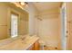 Bathroom featuring a combined shower and bathtub and a vanity sink at 11833 Amistoso Ln, Las Vegas, NV 89138