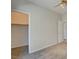 This bedroom features neutral walls, carpet, and a closet for ample storage at 11833 Amistoso Ln, Las Vegas, NV 89138
