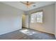 This bedroom features carpet and a window that allows plenty of natural light at 11833 Amistoso Ln, Las Vegas, NV 89138