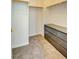 Walk-in closet featuring shelving and drawers for ample storage space at 11833 Amistoso Ln, Las Vegas, NV 89138