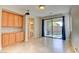 Dining room with built-in cabinets and sliding glass doors to backyard at 11833 Amistoso Ln, Las Vegas, NV 89138