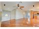 Spacious living room featuring hardwood floors, a cozy fireplace, and ample natural light at 11833 Amistoso Ln, Las Vegas, NV 89138