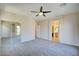Spacious main bedroom with carpet, ceiling fan, walk in closet and attached bathroom at 11833 Amistoso Ln, Las Vegas, NV 89138