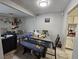 Dining area features a table and bench with the kitchen area in the background at 1338 Smoke Tree Ave, Las Vegas, NV 89108