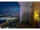 Balcony view showcasing nighttime skyline and nearby outdoor recreation at 135 E Harmon Ave # 3620, Las Vegas, NV 89109
