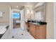Bathroom featuring vanity, stand-up shower and soaking tub at 135 E Harmon Ave # 3620, Las Vegas, NV 89109