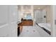 Bright bathroom with vanity, stand-up shower, and soaking tub at 135 E Harmon Ave # 3620, Las Vegas, NV 89109