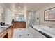 Bathroom with a double vanity, soaking tub, and stand-up shower at 135 E Harmon Ave # 3620, Las Vegas, NV 89109