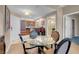 Elegant dining area flowing into a kitchenette, offering seamless living at 135 E Harmon Ave # 3620, Las Vegas, NV 89109