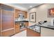 Contemporary kitchenette with stainless steel appliances and sleek countertops at 135 E Harmon Ave # 3620, Las Vegas, NV 89109