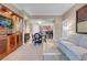Comfortable living room layout with refined furniture and access to a modern kitchen at 135 E Harmon Ave # 3620, Las Vegas, NV 89109
