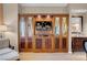 Stylish living area featuring a large wood entertainment center with a flat-screen TV at 135 E Harmon Ave # 3620, Las Vegas, NV 89109
