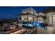 Stunning home with a rooftop deck, pool, fire pit, and outdoor entertaining spaces at 1491 Reims Dr, Henderson, NV 89012