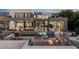 Modern home featuring a swimming pool, spa, and an outdoor kitchen with great mountain views at 1491 Reims Dr, Henderson, NV 89012