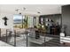 Stylish game room with a foosball table, modern lighting, and city views for entertainment and relaxation at 1491 Reims Dr, Henderson, NV 89012