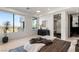 Modern main bedroom boasts a large window with city views, and a sleek ensuite bathroom at 1491 Reims Dr, Henderson, NV 89012