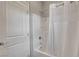 Clean bathroom featuring a shower-tub combination with white tiles and a shower curtain at 15 Santo Mio Ct, Henderson, NV 89011