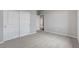 Neutral bedroom with carpet, closet, and access to hallway at 15 Santo Mio Ct, Henderson, NV 89011