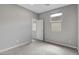 Clean, neutral bedroom featuring carpet, a window with a view, and a connecting door at 15 Santo Mio Ct, Henderson, NV 89011