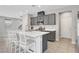 Beautiful kitchen with stainless steel appliances and island with breakfast bar seating at 15 Santo Mio Ct, Henderson, NV 89011