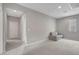 Neutral living room with carpet, neutral paint, recessed lights, and comfortable seating at 15 Santo Mio Ct, Henderson, NV 89011