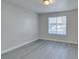 Cozy bedroom with wood flooring and natural light at 1550 Jamielinn Ln # 102, Las Vegas, NV 89110