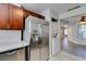 Kitchen features a stainless steel refrigerator, dishwasher, and tile flooring at 1550 Jamielinn Ln # 102, Las Vegas, NV 89110