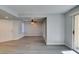 The living room has hard floors, and an open concept with access to other rooms at 1550 Jamielinn Ln # 102, Las Vegas, NV 89110