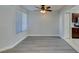 Open living space features hardwood-style floors and a kitchen at 1550 Jamielinn Ln # 102, Las Vegas, NV 89110
