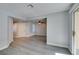 The living room showcases an open layout, hard flooring and plenty of light at 1550 Jamielinn Ln # 102, Las Vegas, NV 89110