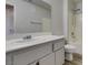 Bright bathroom with a large mirror, white sink, gray vanity, and shower-tub combination at 1881 W Alexander Rd # 2079, North Las Vegas, NV 89032