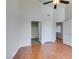 Spacious bedroom features neutral walls, hardwood floors and multiple closets and bathroom entrances at 1881 W Alexander Rd # 2079, North Las Vegas, NV 89032