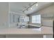 Kitchen featuring bright countertops, a gas range, and plenty of natural light at 1881 W Alexander Rd # 2079, North Las Vegas, NV 89032