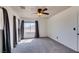 Bedroom features include neutral carpet, a window for natural light, and a ceiling fan at 189 Regal Sunset Ave, Henderson, NV 89002