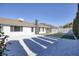 Relax in this spacious backyard featuring gravel, artificial turf, and mature privacy landscaping at 1943 Hallwood Dr, Las Vegas, NV 89119