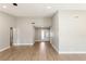 Bright and airy living room featuring wood floors and a double door entryway at 1943 Hallwood Dr, Las Vegas, NV 89119