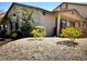 Charming property with well-maintained landscaping and desert rock ground cover at 2050 N Los Feliz St # 114, Las Vegas, NV 89156