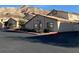 Property exterior featuring neatly landscaped grounds in front of the building at 2050 N Los Feliz St # 114, Las Vegas, NV 89156