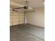 Spacious attached garage with an automatic door at 2050 N Los Feliz St # 114, Las Vegas, NV 89156