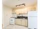 Functional kitchen with white appliances and ample storage space, ready for your culinary creations at 211 Kansas Ave, Henderson, NV 89015